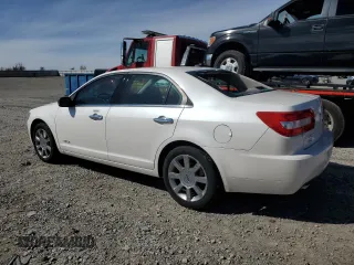 2009 Lincoln MKZ z VIN 3LNHM28T39R629987, wystawiony jako Copart lot #50097385 z przebiegiem 132 144 mil mil oraz Szkoda całkowita • Salvage title. Historia ofert i sprzedaży dostępna na DreamBid. Obrazek 2.
