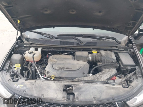 2023 Chrysler Pacifica Touring L with VIN 2C4RC1BG1PR550628, listed as a IAAI auction lot 42553430 with 61,773 mi miles and . Bid and sale history available at DreamBid. Image 10.