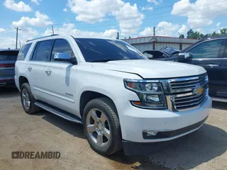 2020 Chevrolet Tahoe LTZ with VIN 1GNSCCKCXLR215899, listed as a IAAI auction lot 40128171 with 109,541 mi miles and . Bid and sale history available at DreamBid. Image 1.