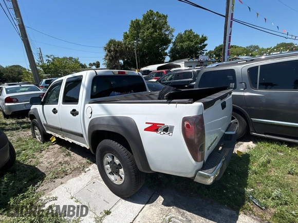 2006 Chevrolet Colorado 2LT z VIN 1GCDT136968146177, wystawiony jako Copart lot #57607155 z przebiegiem 276 364 mil mil oraz Czysty tytuł • Clean title. Historia ofert i sprzedaży dostępna na DreamBid. Obrazek 3.