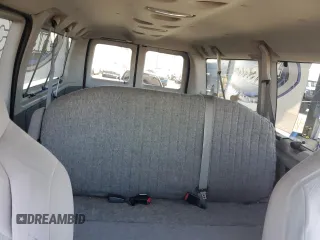 2010 Ford Econoline Passenger XL with VIN 1FMNE1BW3ADA25124, listed as a Copart auction lot 56899235 with 244,010 mi miles and Salvage title. Bid and sale history available at DreamBid. Image 10.