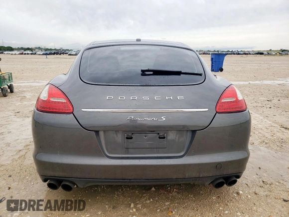 2013 Porsche Panamera S E-Hybrid z VIN WP0AD2A72DL045168, wystawiony jako Copart lot #59136215 z przebiegiem 139 576 mil mil oraz Czysty tytuł • Clean title. Historia ofert i sprzedaży dostępna na DreamBid. Obrazek 6.