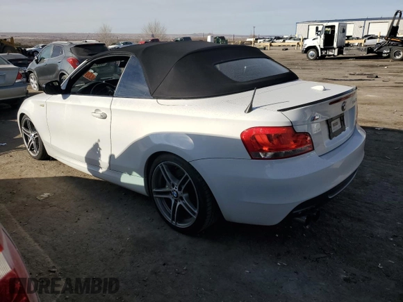 2013 BMW 1 Series 135i with VIN WBAUN7C57DVM27118, listed as a Copart auction lot 86964304 with 57,182 mi miles and Salvage Title. Bid and sale history available at carsss.com. Image 2.