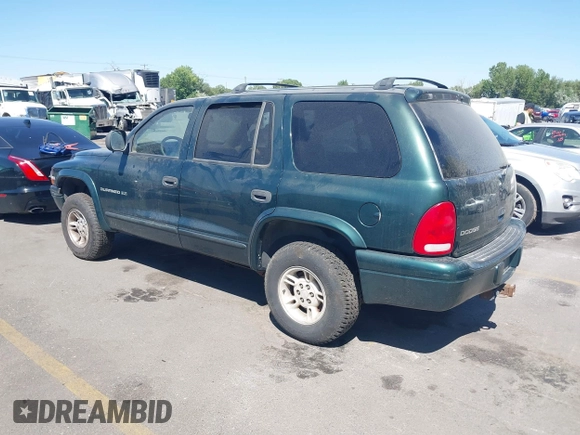 1999 Dodge Durango with VIN 1B4HS28Z7XF522849, listed as a IAAI auction lot 42678224 with 185,118 mi miles and . Bid and sale history available at DreamBid. Image 3.