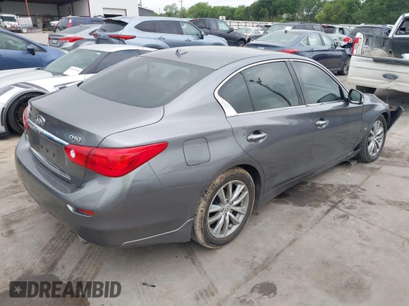 2015 Infiniti Q50 Premium z VIN JN1BV7AR7FM408015, wystawiony jako IAAI lot #42083301 z przebiegiem 58 817 mil mil oraz . Historia ofert i sprzedaży dostępna na DreamBid. Obrazek 4.