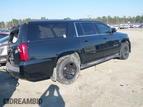 2018 Chevrolet Suburban LT with VIN 1GNSKHKCXJR268938, listed as a IAAI auction lot 41672886 with 76,844 mi miles and . Bid and sale history available at DreamBid. Image 4.