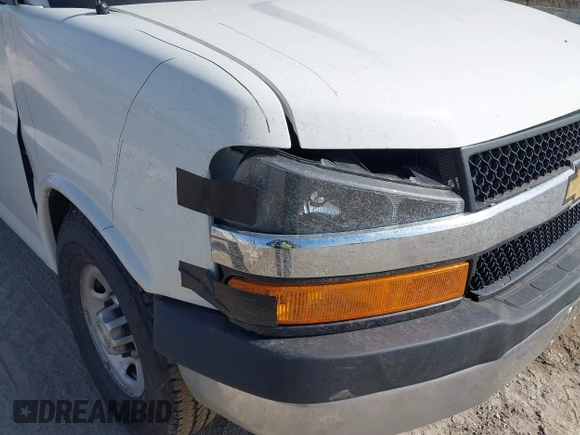 2020 Chevrolet Express Cargo Van with VIN 1GCZGHFG7L1235144, listed as a IAAI auction lot 41700301 with 67,678 mi miles. Bid and sale history available at carsss.com. Image 6.