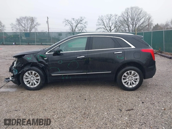 2018 Cadillac XT5 FWD with VIN 1GYKNARS6JZ160993, listed as a IAAI auction lot 41472847 with 113,415 mi miles. Bid and sale history available at carsss.com. Image 14.