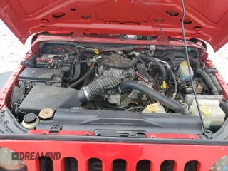 2008 Jeep Wrangler Unlimited X with VIN 1J4GA39118L607733, listed as a Copart auction lot 54506485 with 114,975 mi miles and Salvage Title. Bid and sale history available at DreamBid. Image 12.
