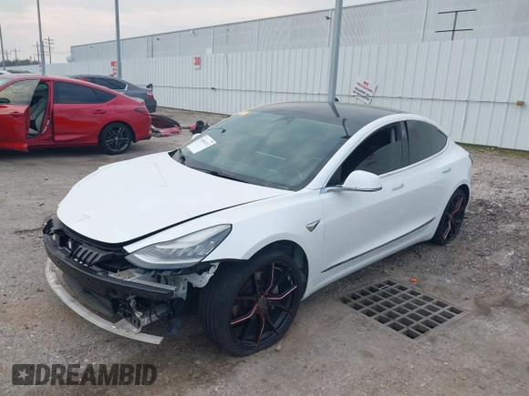 2019 Tesla Model 3 Mid Range with VIN 5YJ3E1EA8KF472540, listed as a IAAI auction lot 41661312 with 75,575 mi miles and . Bid and sale history available at DreamBid. Image 22.