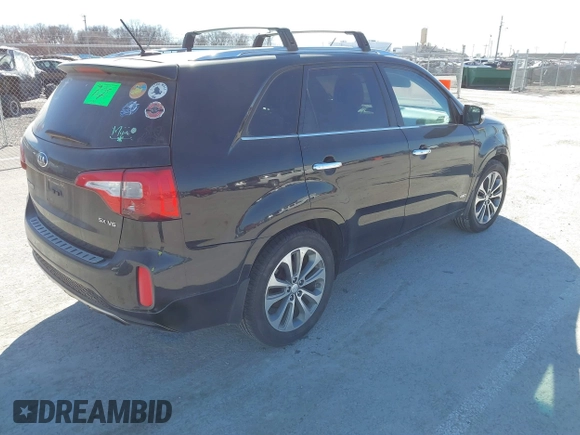 2015 Kia Sorento SX with VIN 5XYKWDA70FG565779, listed as a IAAI auction lot 41675010 with 134,060 mi miles. Bid and sale history available at carsss.com. Image 4.