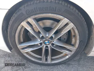 2016 BMW 6 Series 640i xDrive with VIN WBA6D2C51GGT66209, listed as a IAAI auction lot 42064405 with 113,500 mi miles and . Bid and sale history available at carsss.com. Image 12.