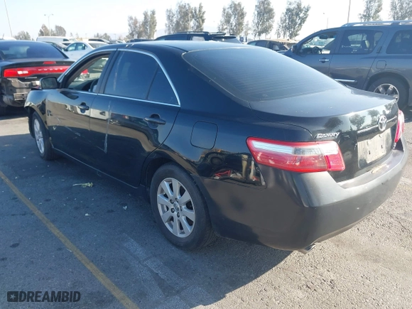 2008 Toyota Camry LE with VIN 4T1BK46K48U058681, listed as a IAAI auction lot 41194534 with 214,271 mi miles. Bid and sale history available at carsss.com. Image 3.