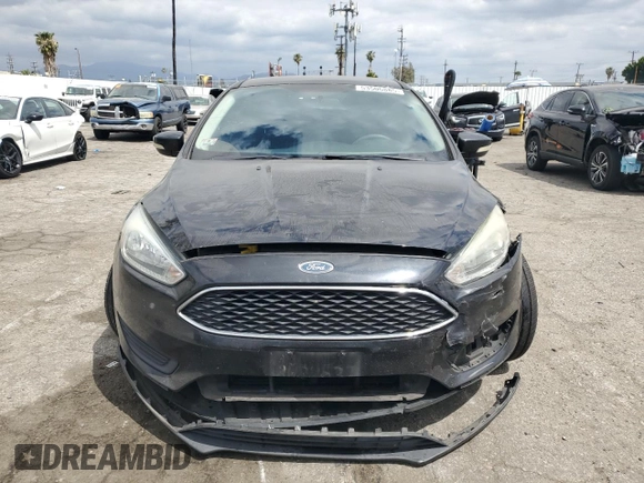 2015 Ford Focus SE with VIN 1FADP3F20FL249872, listed as a Copart auction lot 53506885 with 97,078 mi miles and Salvage title. Bid and sale history available at DreamBid. Image 5.