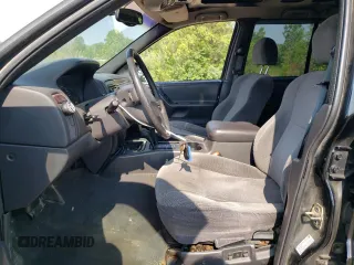 2000 Jeep Grand Cherokee Laredo with VIN 1J4GW48S6YC404063, listed as a Copart auction lot 59442725 with 268,543 mi miles and Salvage title. Bid and sale history available at DreamBid. Image 7.