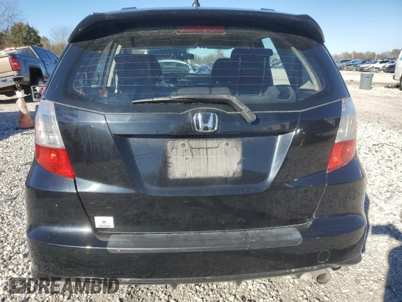 2013 Honda Fit Sport with VIN JHMGE8H54DC033780, listed as a Copart auction lot 79557204 with 67,384 mi miles and Clean Title. Bid and sale history available at carsss.com. Image 6.