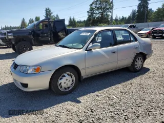 2002 Toyota Corolla CE with VIN 1NXBR12E12Z609389, listed as a Copart auction lot 59736635 with 176,569 mi miles and Salvage title. Bid and sale history available at DreamBid. Image 1.