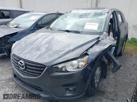 2016 Mazda CX-5 Touring with VIN JM3KE2CY6G0832967, listed as a IAAI auction lot 41943527 with 1 mi miles. Bid and sale history available at carsss.com. Image 2.