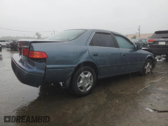 2001 Toyota Camry CE z VIN JT2BG22K710561238, wystawiony jako Copart lot #56686255 z przebiegiem Nie podano mil oraz Szkoda całkowita • Salvage title. Historia ofert i sprzedaży dostępna na DreamBid. Obrazek 3.