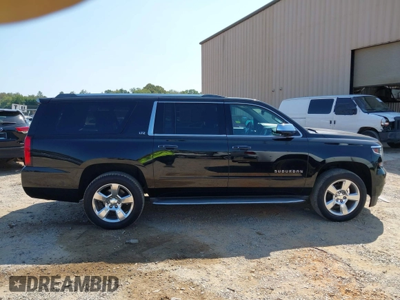 2015 Chevrolet Suburban LTZ with VIN 1GNSKKKC7FR205638, listed as a IAAI auction lot 40284367 with 103,530 mi miles and . Bid and sale history available at DreamBid. Image 13.