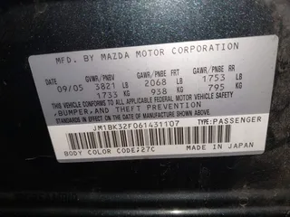 2006 Mazda 3 i Touring with VIN JM1BK32F061431107, listed as a IAAI auction lot 41792011 with 189,533 mi miles and . Bid and sale history available at DreamBid. Image 9.