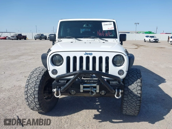 2014 Jeep Wrangler Unlimited Rubicon with VIN 1C4BJWFG1EL167423, listed as a IAAI auction lot 41861109 with 104,669 mi miles. Bid and sale history available at carsss.com. Image 12.