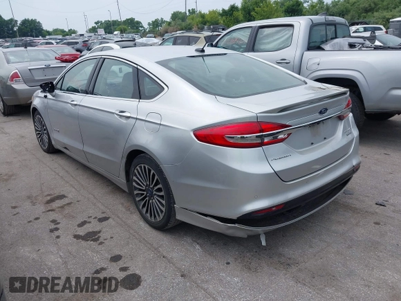 2017 Ford Fusion Hybrid Titanium с VIN 3FA6P0RU5HR181755, выставлен на аукционе IAAI как лот 42704832 с пробегом 152 688 миль миль и . История ставок и продаж доступна на DreamBid. Изображение 3.