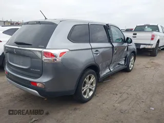 2015 Mitsubishi Outlander SE with VIN JA4AZ3A39FZ007936, listed as a IAAI auction lot 41003206 with 136,017 mi miles and . Bid and sale history available at DreamBid. Image 4.