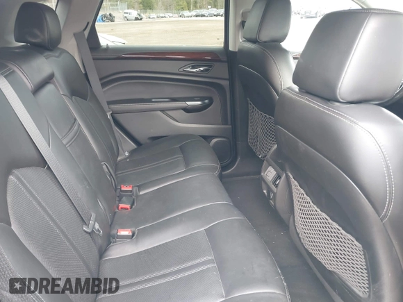 2014 Cadillac SRX Luxury Collection z VIN 3GYFNEE33ES670356, wystawiony jako IAAI lot #42008087 z przebiegiem 59 953 mil mil oraz . Historia ofert i sprzedaży dostępna na DreamBid. Obrazek 8.
