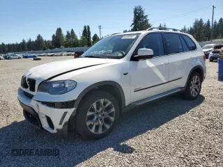 2012 BMW X5 35i z VIN 5UXZV4C5XCL987618, wystawiony jako Copart lot #60308965 z przebiegiem 98 195 mil mil oraz Szkoda całkowita • Salvage title. Historia ofert i sprzedaży dostępna na DreamBid. Obrazek 1.