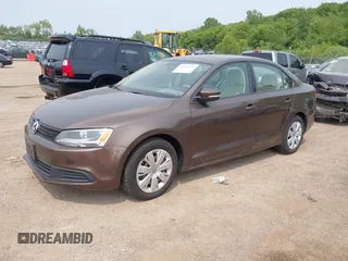 2014 Volkswagen Jetta SE with VIN 3VWD07AJ7EM251973, listed as a IAAI auction lot 42415573 with 124,323 mi miles and . Bid and sale history available at DreamBid. Image 2.