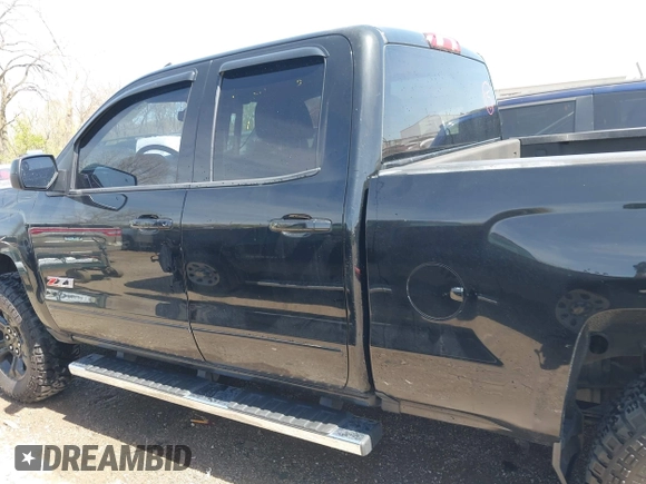 2017 Chevrolet Silverado 1500 LT with VIN 1GCVKRECXHZ270139, listed as a IAAI auction lot 42027722 with 122,571 mi miles and . Bid and sale history available at DreamBid. Image 14.
