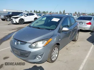 2013 Mazda 2 Touring z VIN JM1DE1LZ0D0162994, wystawiony jako IAAI lot #42406847 z przebiegiem 190 255 mil mil oraz . Historia ofert i sprzedaży dostępna na DreamBid. Obrazek 2.