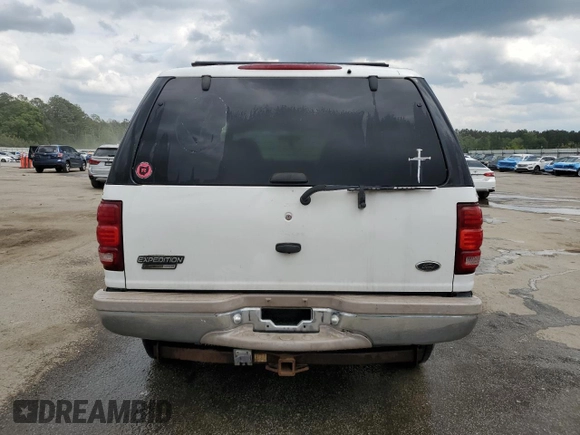 1999 Ford Expedition XLT z VIN 1FMPU18L0XLC10111, wystawiony jako Copart lot #52699205 z przebiegiem Nie podano mil oraz Szkoda całkowita • Salvage title. Historia ofert i sprzedaży dostępna na DreamBid. Obrazek 6.