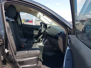 2014 Mazda CX-5 Sport with VIN JM3KE2BE9E0402015, listed as a IAAI auction lot 42098197 with 65,328 mi miles and . Bid and sale history available at carsss.com. Image 5.