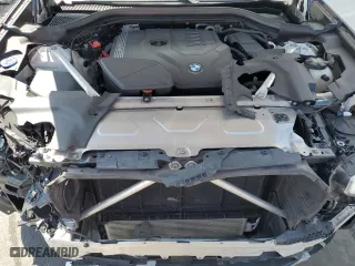 2021 BMW X4 xDrive30i with VIN 5UX2V1C01M9E03922, listed as a Copart auction lot 48335205 with 58,867 mi miles and Non Repairable. Bid and sale history available at carsss.com. Image 12.