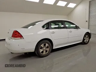 2014 Chevrolet Impala LS z VIN 2G1WA5E3XE1170538, wystawiony jako Copart lot #57675165 z przebiegiem 154 114 mil mil oraz Czysty tytuł • Clean title. Historia ofert i sprzedaży dostępna na DreamBid. Obrazek 3.