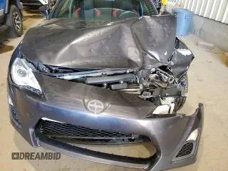 2014 Scion FR-S z VIN JF1ZNAA11E9701435, wystawiony jako Copart lot #72603834 z przebiegiem 127 940 mil mil oraz Szkoda całkowita • Salvage title. Historia ofert i sprzedaży dostępna na DreamBid. Obrazek 11.