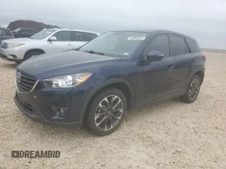 2016 Mazda CX-5 Grand Touring with VIN JM3KE2DY7G0920506, listed as a Copart auction lot 52866254 with 122,615 mi miles and Clean Title. Bid and sale history available at carsss.com. Image 1.