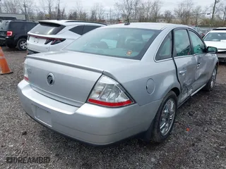 2009 Mercury Sable Premier with VIN 1MEHM42W49G631949, listed as a IAAI auction lot 41867802 with 138,208 mi miles. Bid and sale history available at carsss.com. Image 4.