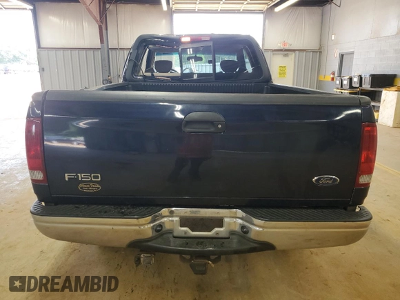 2002 Ford F-150 XL with VIN 1FTRX18L62NA69837, listed as a Copart auction lot 61581935 with 130,078 mi miles and Salvage title. Bid and sale history available at DreamBid. Image 6.