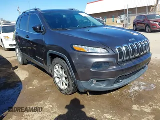 2016 Jeep Cherokee 75th Anniversary with VIN 1C4PJLCB2GW160141, listed as a IAAI auction lot 41748822 with 87,411 mi miles. Bid and sale history available at carsss.com. Image 1.