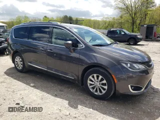 2018 Chrysler Pacifica Touring L with VIN 2C4RC1BG6JR124425, listed as a Copart auction lot 56132055 with 89,575 mi miles and Salvage Title. Bid and sale history available at DreamBid. Image 4.