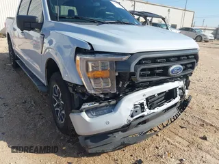 2022 Ford F-150 XL z VIN 1FTEW1EP6NKD68369, wystawiony jako IAAI lot #41985108 z przebiegiem 58 464 mil mil oraz . Historia ofert i sprzedaży dostępna na DreamBid. Obrazek 18.