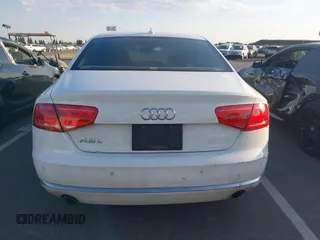 2013 Audi A8 3.0L z VIN WAURGAFD5DN009804, wystawiony jako IAAI lot #42642523 z przebiegiem 141 252 mil mil oraz . Historia ofert i sprzedaży dostępna na DreamBid. Obrazek 16.