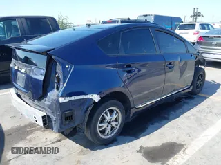 2015 Toyota Prius Four with VIN JTDKN3DU5F1954853, listed as a IAAI auction lot 40617411 with Not provided miles and . Bid and sale history available at DreamBid. Image 4.