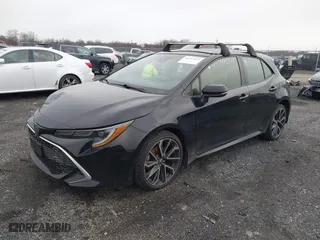 2021 Toyota Corolla Hatchback XSE with VIN JTNC4MBE5M3106428, listed as a IAAI auction lot 41497937 with 94,951 mi miles. Bid and sale history available at carsss.com. Image 2.