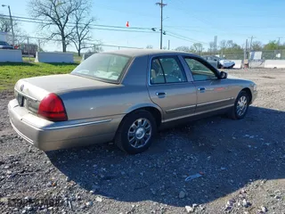 2006 Mercury Grand Marquis LS Premium with VIN 2MEFM75W46X654674, listed as a IAAI auction lot 42039177 with 157,171 mi miles. Bid and sale history available at carsss.com. Image 4.