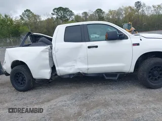2009 Toyota Tundra 4WD Truck with VIN 5TFBW54119X085037, listed as a IAAI auction lot 41914195 with 211,913 mi miles. Bid and sale history available at carsss.com. Image 13.