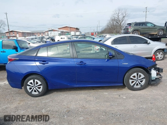 2018 Toyota Prius Two with VIN JTDKARFU3J3547008, listed as a IAAI auction lot 41804861 with 125,946 mi miles. Bid and sale history available at carsss.com. Image 13.